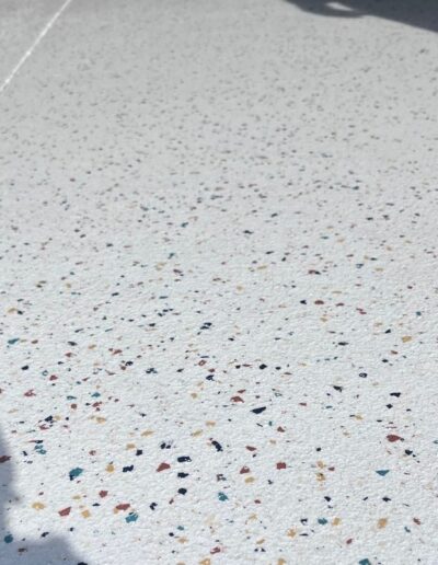 epoxy floor with colorful flakes white backgroound