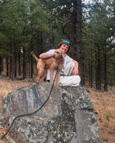 caiden Tinant black hills coating with his dog